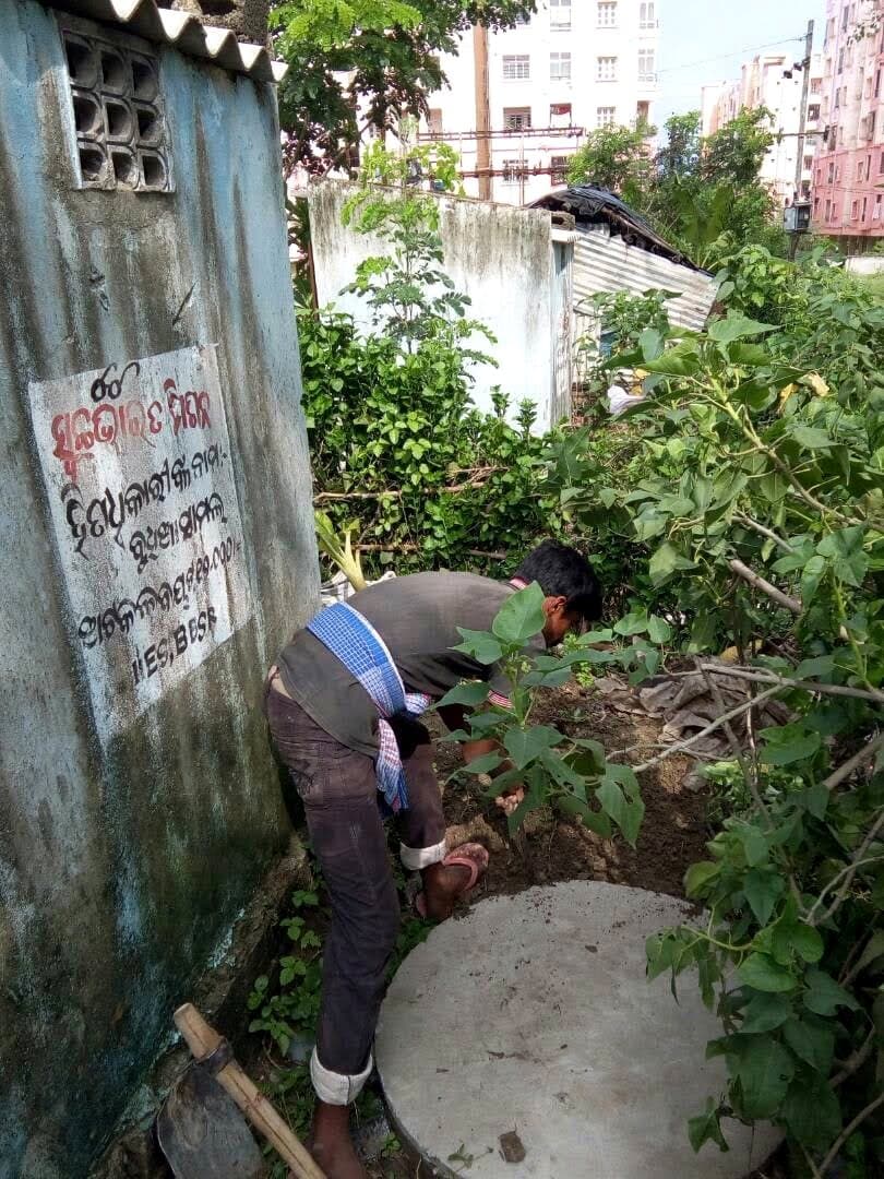 Twin-pit sanitation work under way at a project site